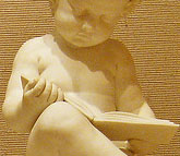Statue of child reading